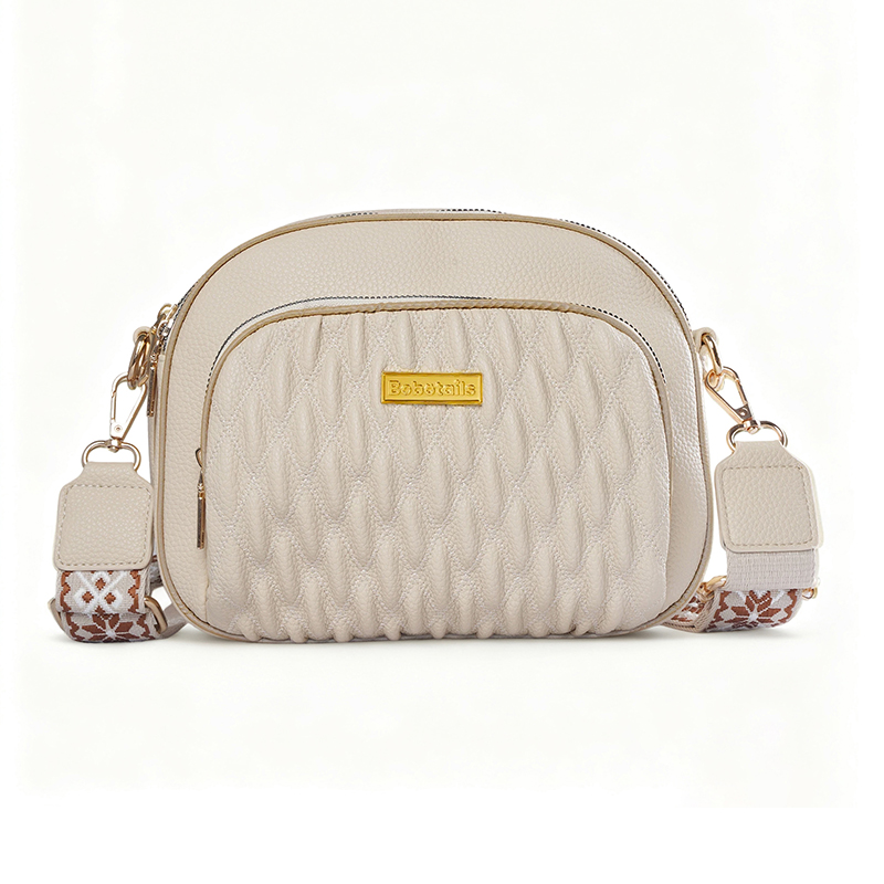 beige dog walking bag